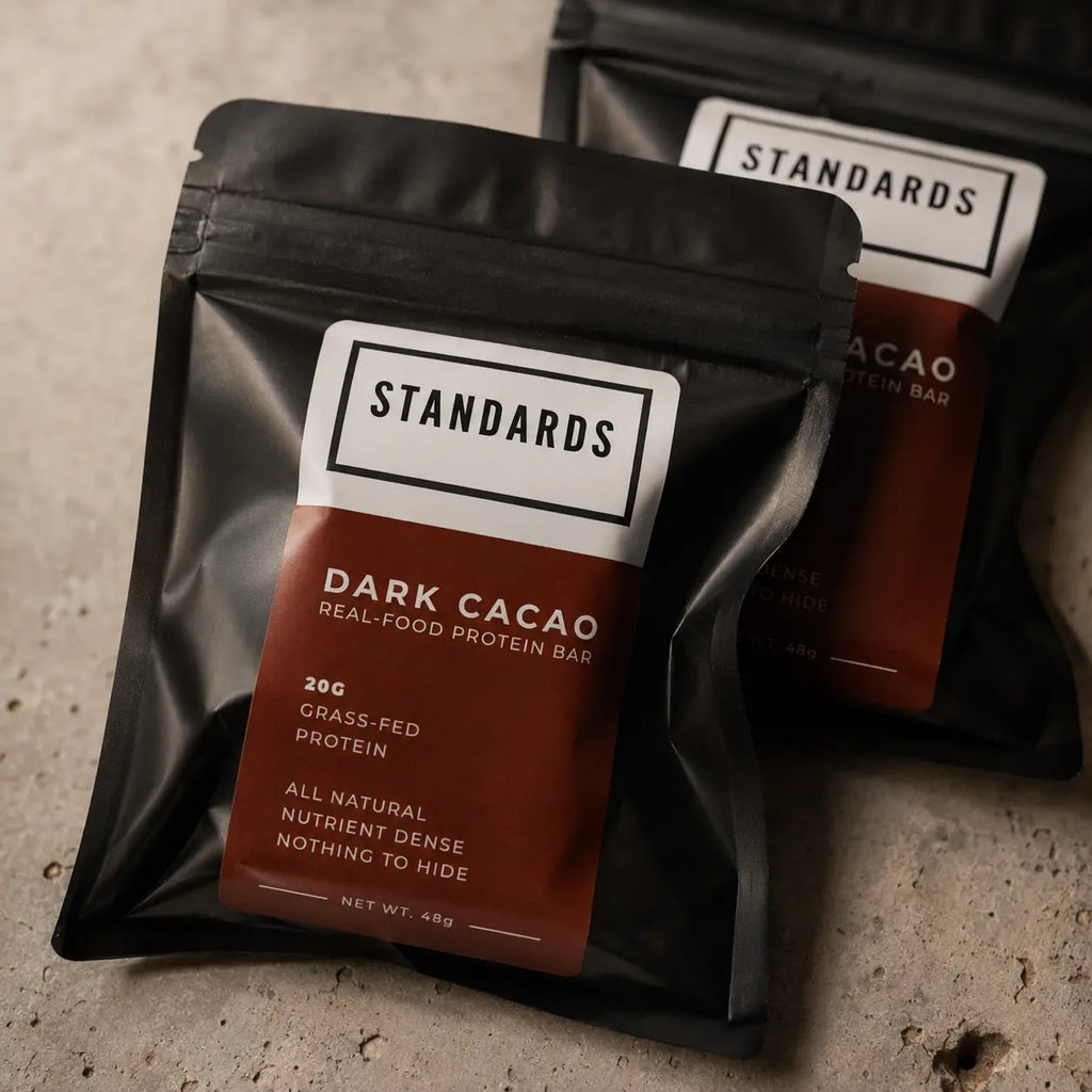 Two Dark Cacao pouches on stone